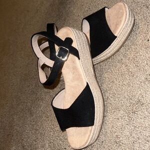 Black espadrilles never worn out! Runs big but comfortable